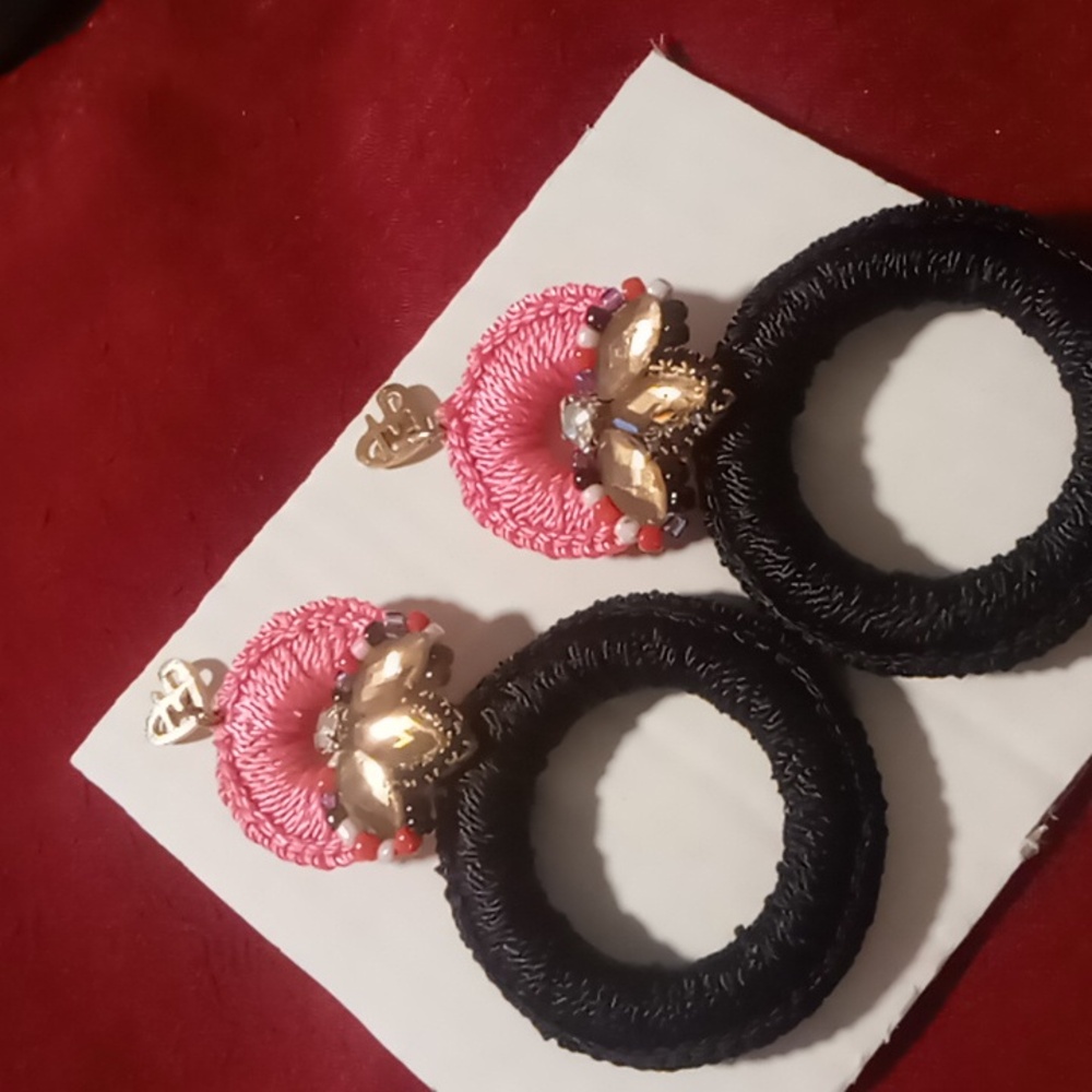 Double hoop thread wrapped earrings.